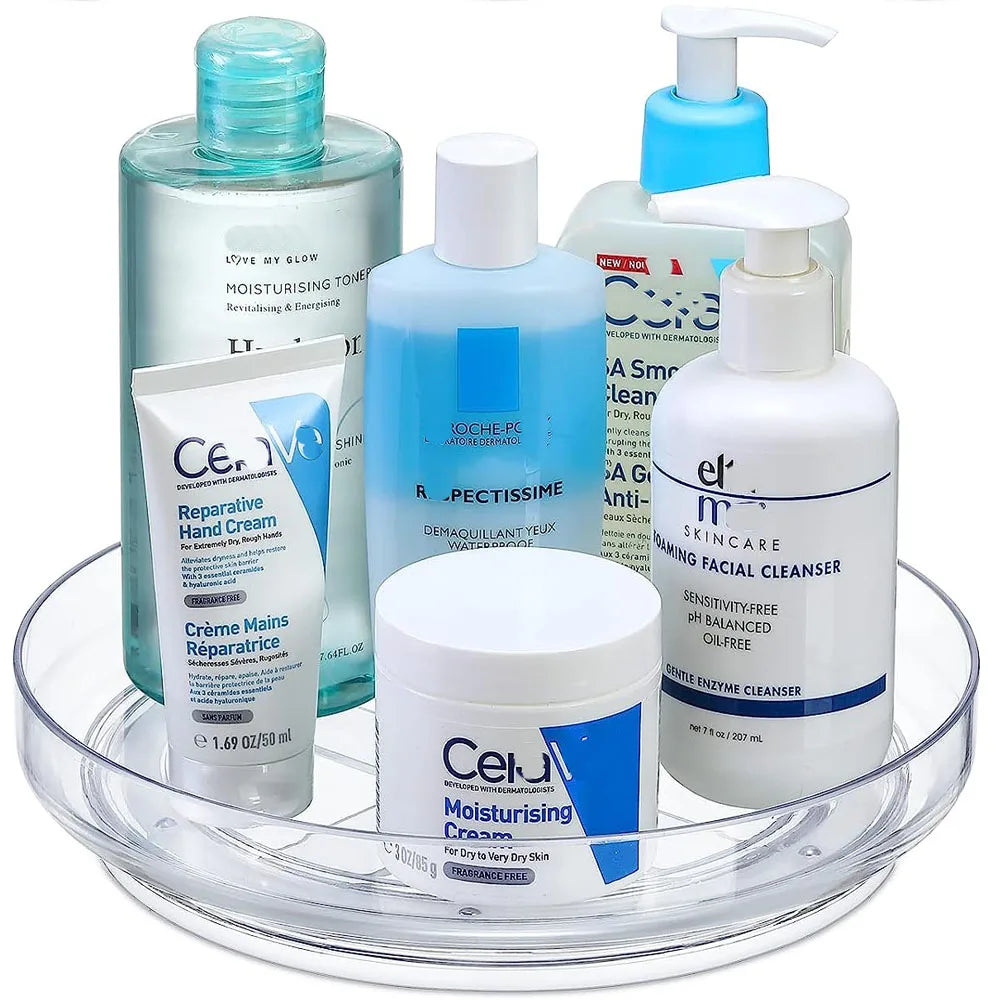 Clear tray holding skincare products including moisturising toner, hand cream, facial cleanser, and makeup remover