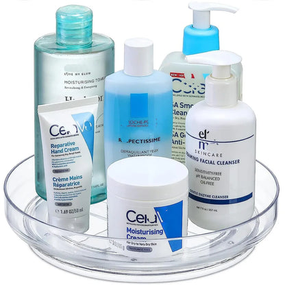 Clear tray holding skincare products including moisturising toner, hand cream, facial cleanser, and makeup remover