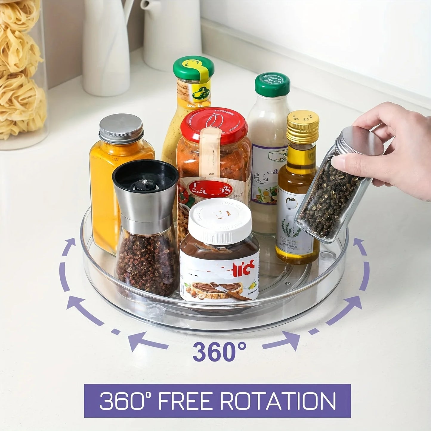 360-degree rotating clear spice rack organizer with various seasoning bottles on kitchen counter
