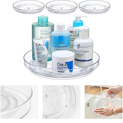 Clear round rotating organizer tray holding skincare products like hand cream, toner, and facial cleanser